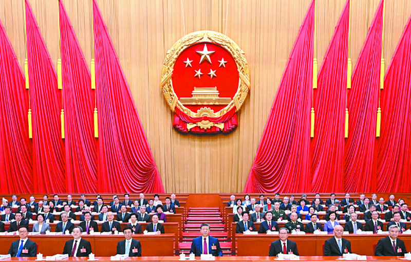 3月5日，第十四届全国人民代表大会第四次会议在北京人民大会堂开幕。党和国家领导人习近平、李强、王沪宁、蔡奇、丁薛祥、李希、韩正等出席大会。 　　□新华社记者 谢环驰 摄.png